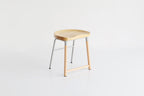 Tabouret bas rembourré gris