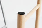 Tabouret bas rembourré gris
