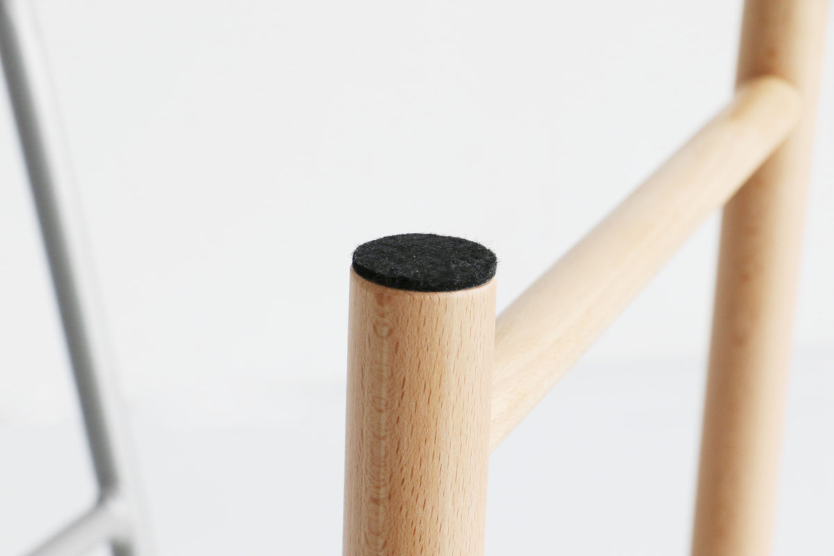 Tabouret bas rembourré gris