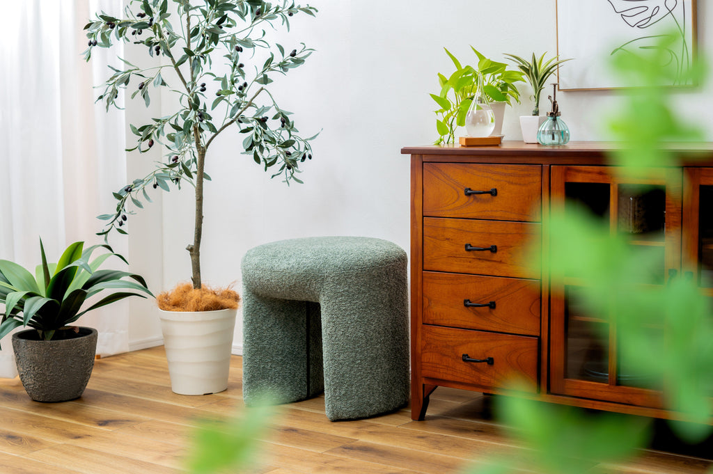 Tabouret rembourré vert